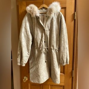 Leather anorak with fur trim hood.  Lux!